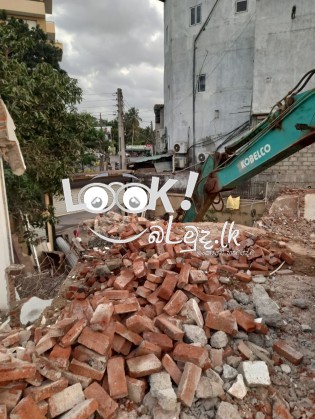 ගොඩනැගිලි කඩා ඉවත් කිරීම.